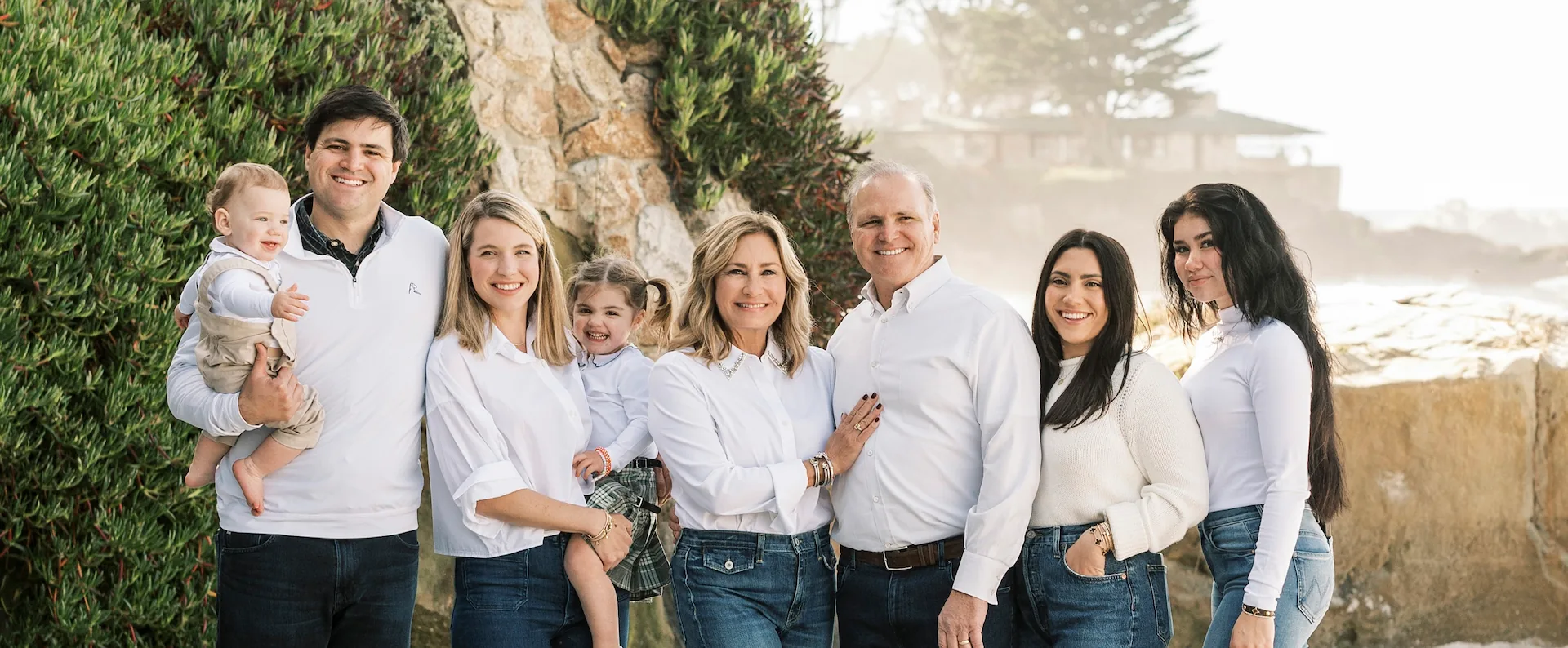 The Bonadelle Family. From left to right: Mr. John A. Bonadelle, holding his son; Mrs. John A. Bonadelle, holding their daughter; Mrs. John Bonadelle; Mr. John Bonadelle; Miss Bianca Bonadelle; Miss Mia Bonadelle.