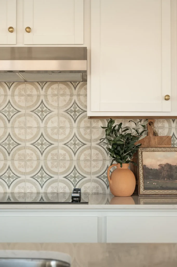 Interior - Kitchen with quartz countertops, electric cooktop, abundant cabinet space