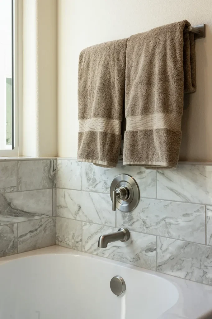Interior - bathtub with luxury tile and brushed-nickel fixtures