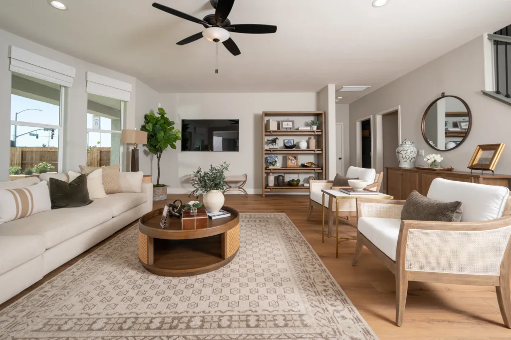 Interior - Great Room with ceiling fan, luxury vinyl flooring, and abundant natural light